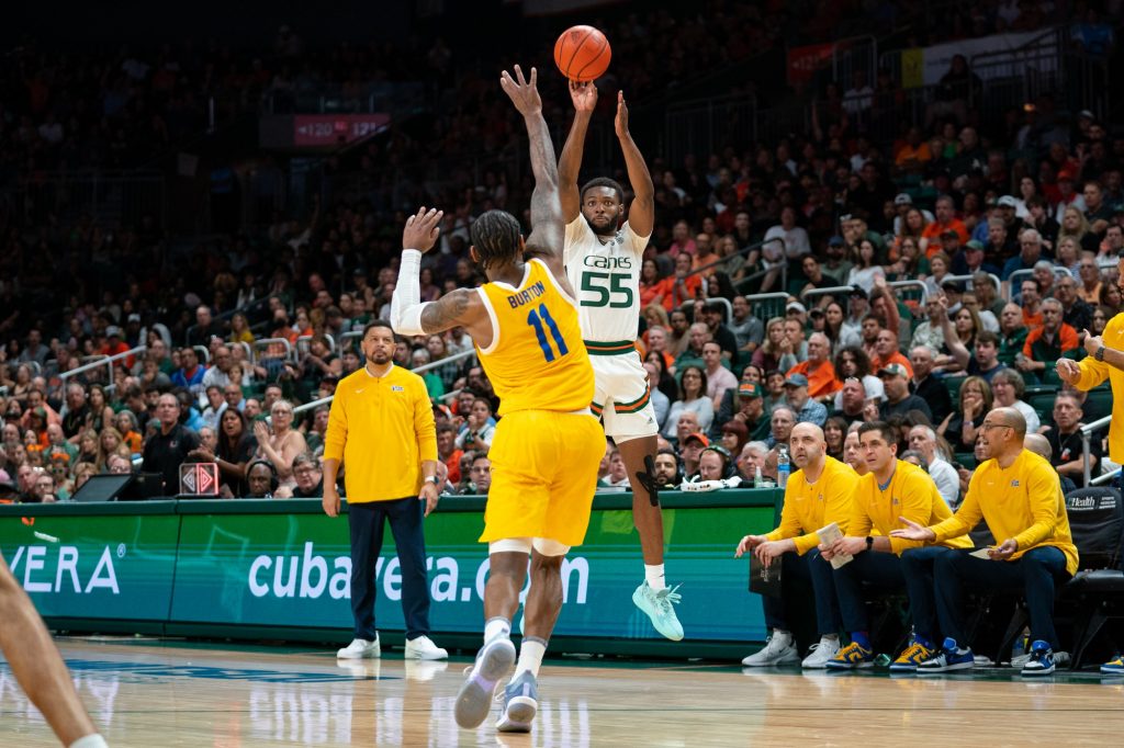 Sophomore guard Wooga Poplar shoots a three-pointer during the first half of Miami’s game versus the University of Pittsburgh in the Watsco Center on March 4, 2023.
