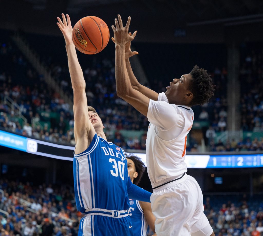Fourth-year junior forward Anthony Walker loses control of the ball during Miami's loss to Duke University on Friday, March 10 at the Greensboro Coliseum Complex.