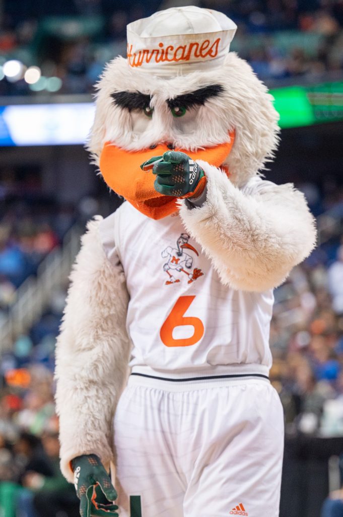 Sebastian the Ibis points to the crowd during Miami's semifinal game against Duke University on Friday, March 10 at the Greensboro Coliseum Complex.