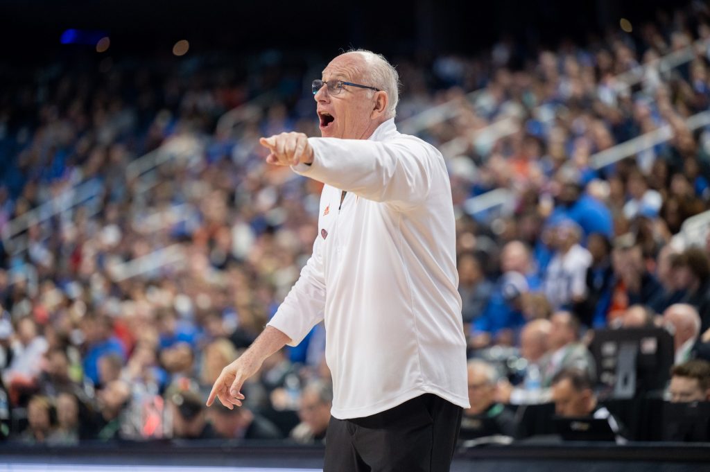 Head coach Jim Larranaga yells to players on the court during Miami's game versus Duke University on Friday, March 10 at the Greensboro Coliseum Complex.
