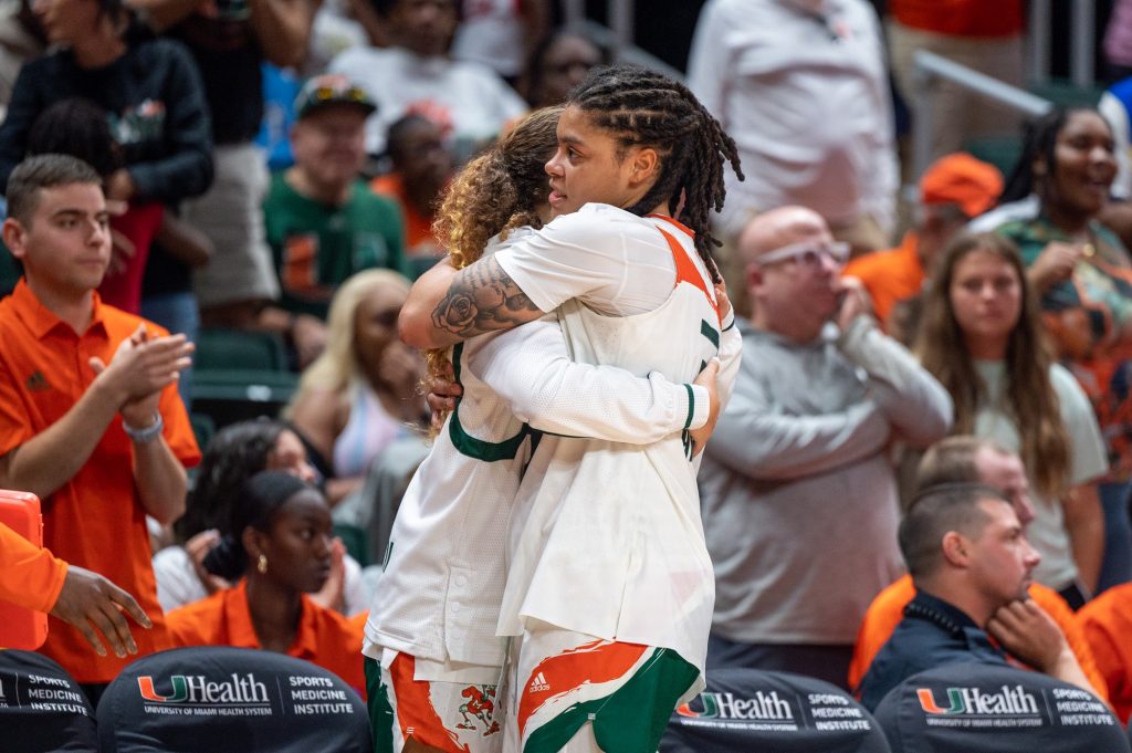 Destiny Harden and Kenza Salgues hug following the conclusion of their last game at the Watsco Center on Sunday, Feb. 16 at the Watsco Center.