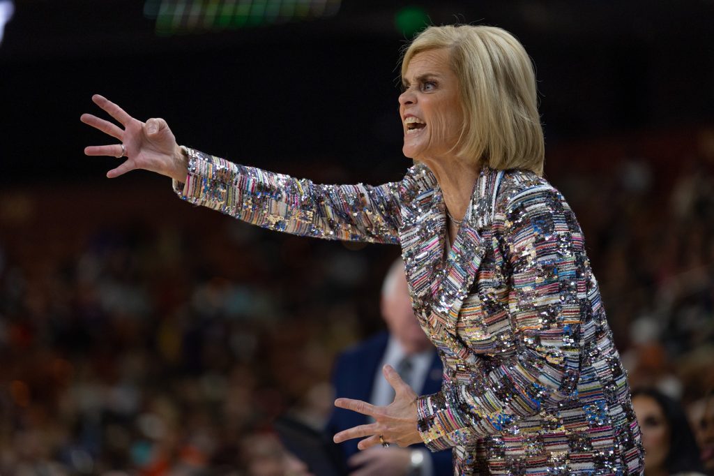 LSU head coach Kim Mulkey yells at the players on the court during the first quarter of Miami’s Elite Eight match-up with the LSU Tigers in the Bon Secours Arena on Sunday, March 26.