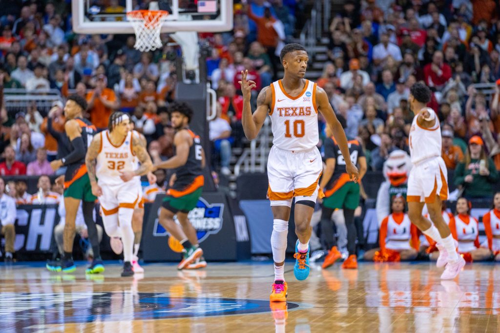 Graduate student guard Sir’Jabari Rice celebrates making a three-pointer during the first half of Miami’s Elite Eight matchup against the University of Texas in the T-Mobile Center in Kansas City, MO on March 26, 2023.