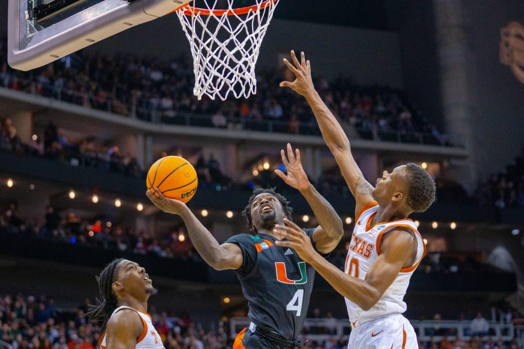 Sophomore guard Bensley Joseph lays up the ball during the first half of Miami’s Elite Eight matchup against the University of Texas in the T-Mobile Center in Kansas City, MO on March 26, 2023.