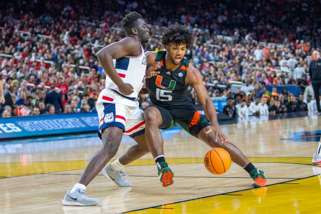 Third-year sophomore forward Norchad Omier drives to the basket during the first half of Miami’s Final Four matchup against the University of Connecticut in NRG Stadium in Houston on April 1, 2023.
