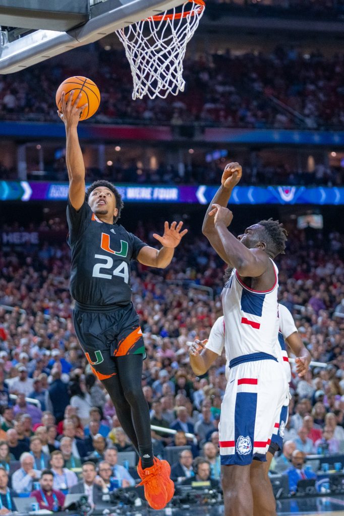Third-year sophomore guard Nijel Pack lays up the ball during the second half of Miami’s Final Four matchup against the University of Connecticut in NRG Stadium in Houston on April 1, 2023.