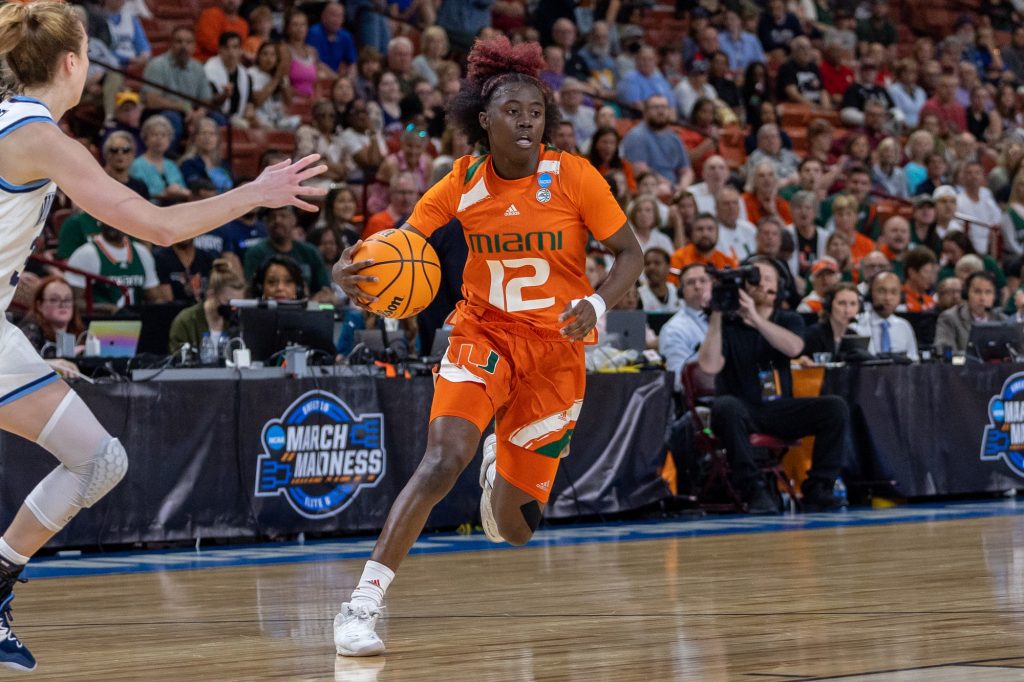 Sophomore guard Ja’Leah Williams drives the ball down the court in the first quarter of Miami’s matchup against Villanova in the Sweet Sixteen at the Bon Secours Wellness Arena on March 24.