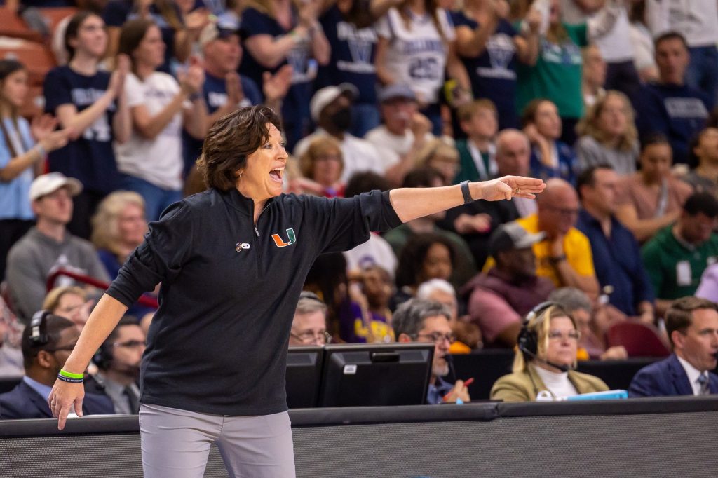 Head coach Katie Meier calls out to players on the court during Miami's Sweet Sixteen win over Villanova on Friday, March 24 at the Bon Secours Wellness Arena.