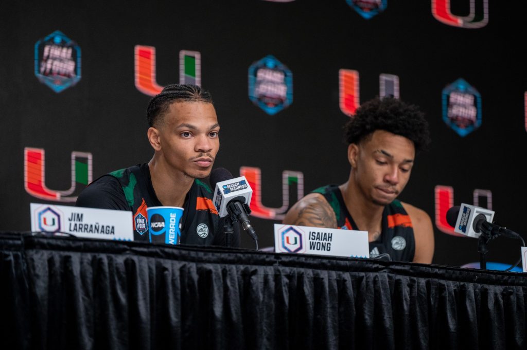 Fourth-year junior guard  Isaiah Wong looks at a reporter at the press conference following Miami's Final Four loss to the University of Connecticut on Saturday, April 1 at the NRG Stadium.