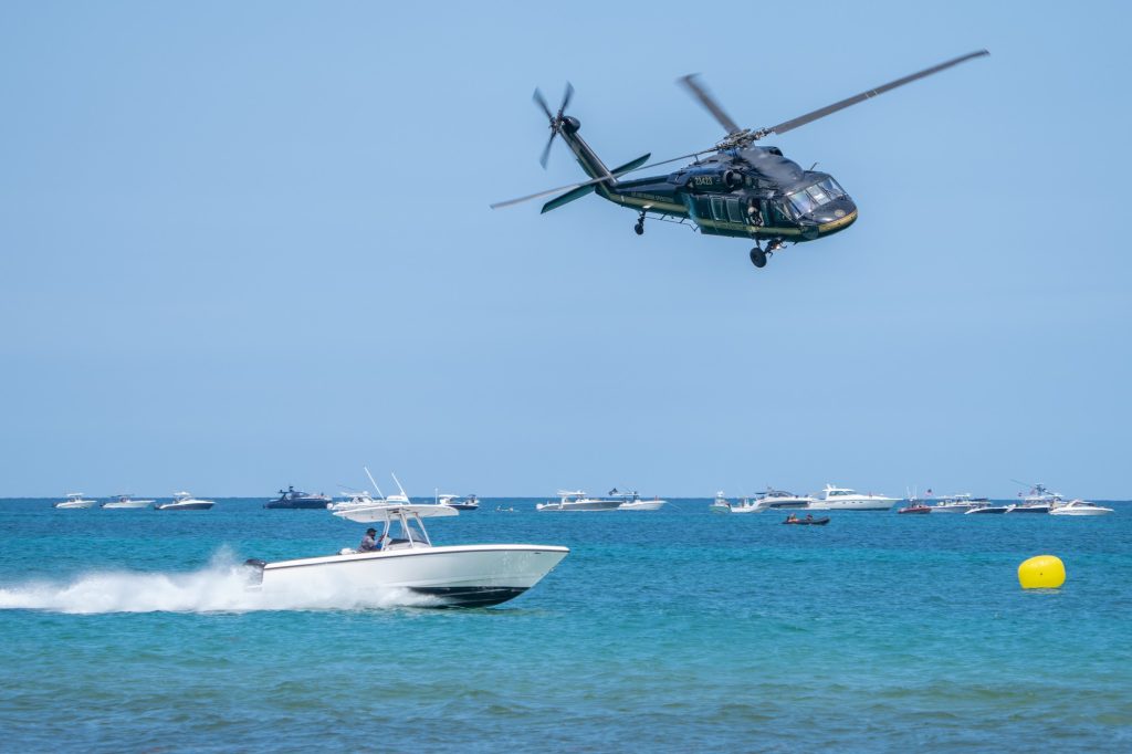 A U.S. Customs and Border Protection UH-60 Black Hawk helicopter showcases its capabilities during a drug interdiction demonstration during the Hyundai Air and Sea Show at Miami Beach on May 28, 2023.
