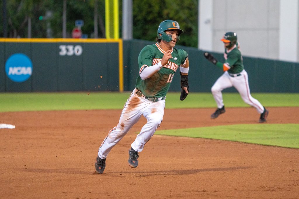 Junior infielder Dominic Pitelli heads home from second after junior infielder CJ Kayfus hit a double in the bottom of the second inning of Miami’s Coral Gables Regional game versus the University of Maine at Mark Light Field on June 2, 2023.