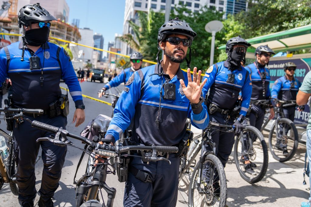 Officer Miranda and fellow officers of the City of Miami Police Bicycle Response Team establish a perimeter around a suspicious television outside of the Wilkie D. Ferguson Jr. United States Courthouse on June 13, 2023.