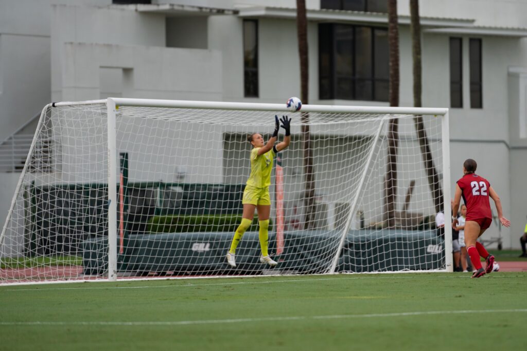 Graduate student goalkeeper Melissa Dagenais blocks FAU’s goal attempt during the first half of Miami’s match versus FAU at Cobb Stadium on Aug. 20, 2023.