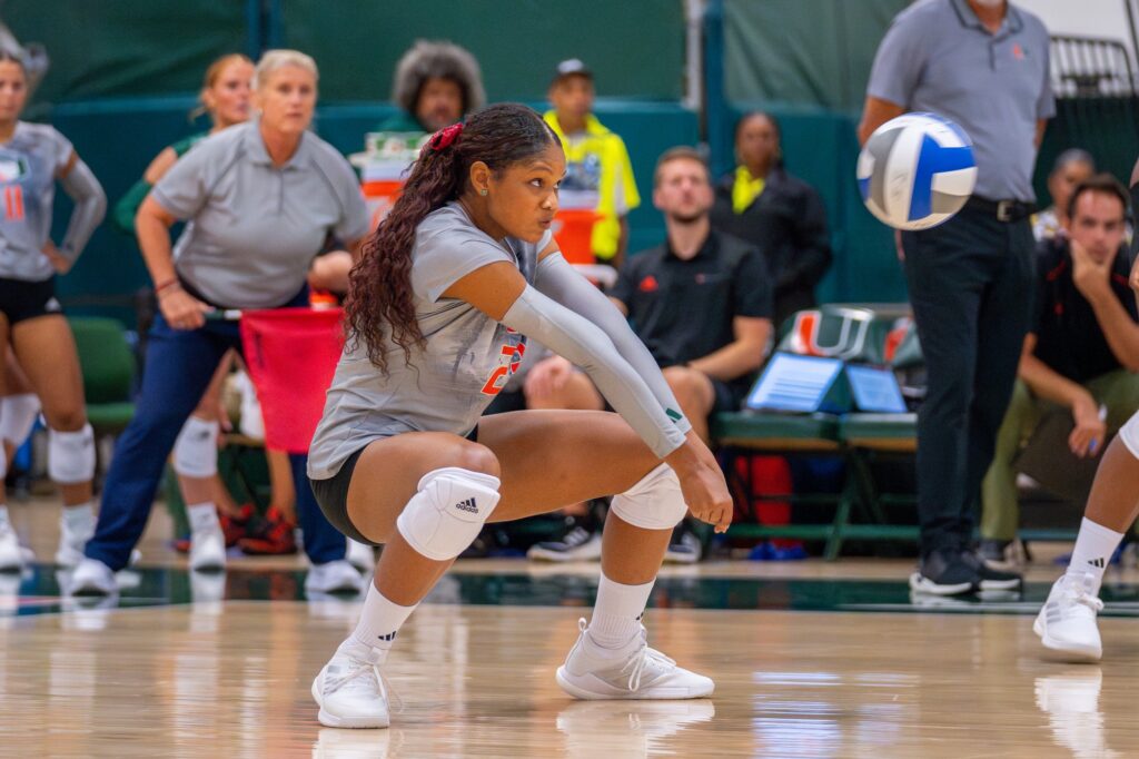 Freshman outside hitter Grace Lopez bumps the ball during the second set of Miami’s match versus Florida Atlantic University in the Knight Sports Complex on Aug. 28, 2023.