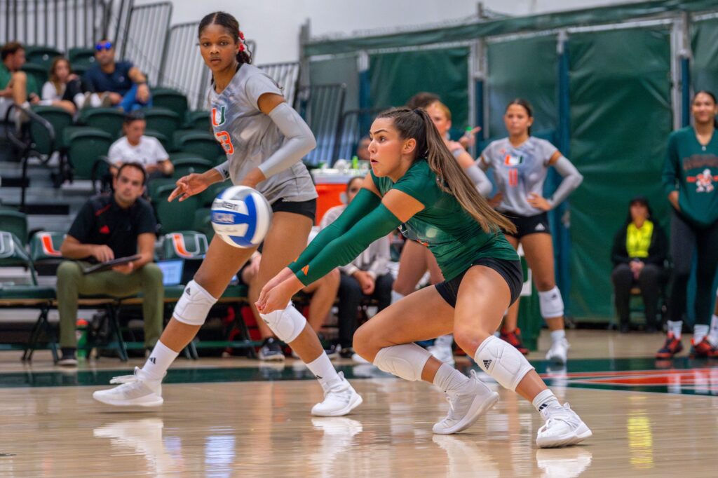 Sophomore libero Naylani Feliciano bumps the ball during the third set of Miami’s match versus Florida Atlantic University in the Knight Sports Complex on Aug. 28, 2023.