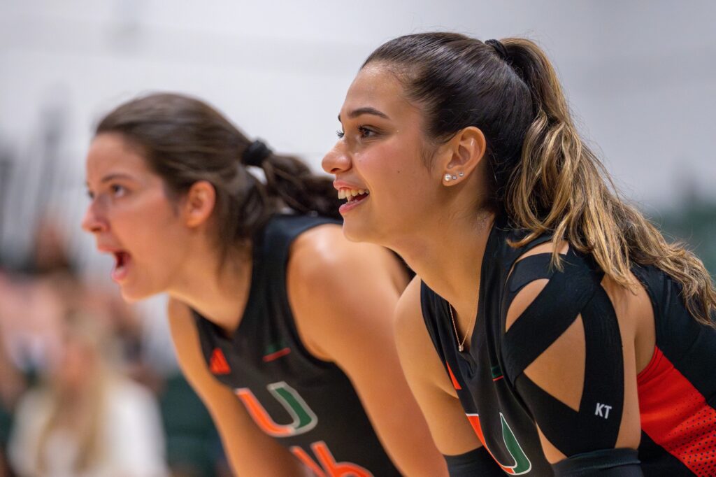 Junior outside hitter Peyman Yardimci and graduate student middle blocker Abby Casiano wait for the serve during the first set of Miami’s match versus Maryland in the Knight Sports Complex on Aug. 25, 2023.