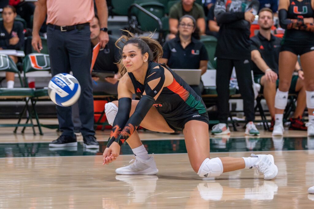 Junior outside hitter Peyman Yardimci extends for the ball during the first set of Miami’s match versus Maryland in the Knight Sports Complex on Aug. 25, 2023.