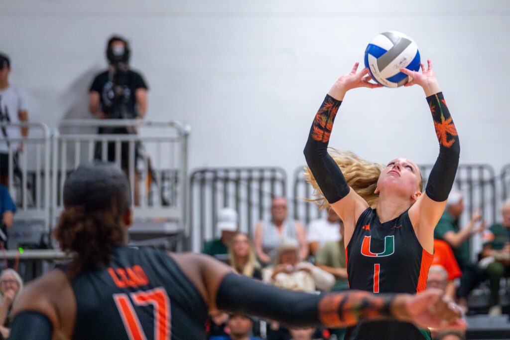 Fifth-year setter Savannah Vach sets the ball during the third set of Miami’s match versus Maryland in the Knight Sports Complex on Aug. 25, 2023.