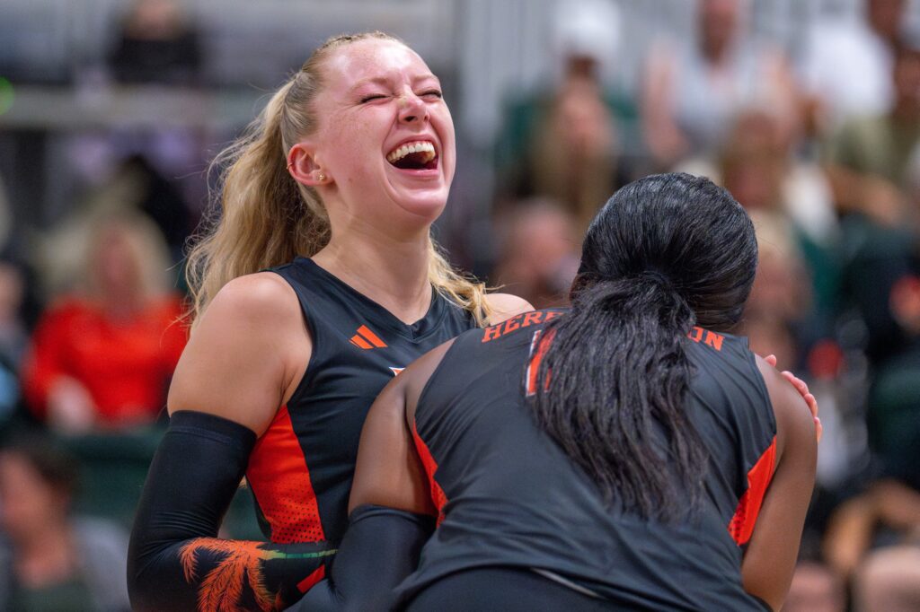 Fifth-year setter Savannah Vach celebrates winning a point during the third set of Miami’s match versus Maryland in the Knight Sports Complex on Aug. 25, 2023.