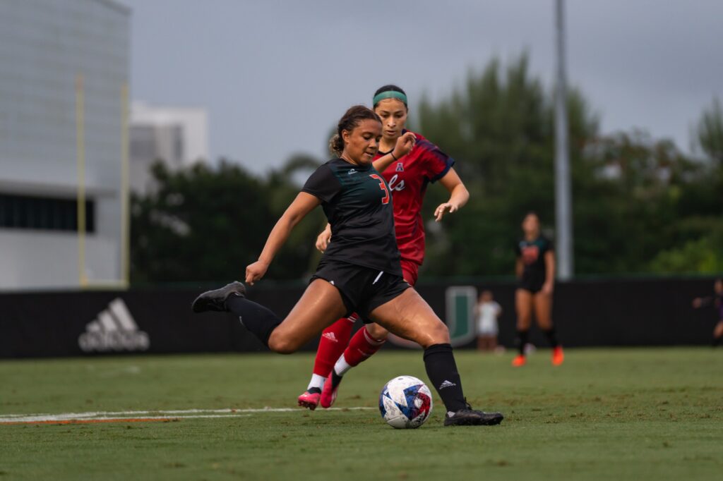 Junior defender Adrianna Serna winds up to kick the ball during Miami’s match versus FAU at Cobb Stadium on Aug. 20, 2023.