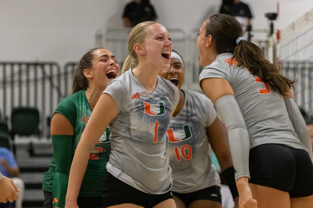 The team celebrates after winning the fourth and final set against FAU on August 28 at the Knight Sports Complex.
