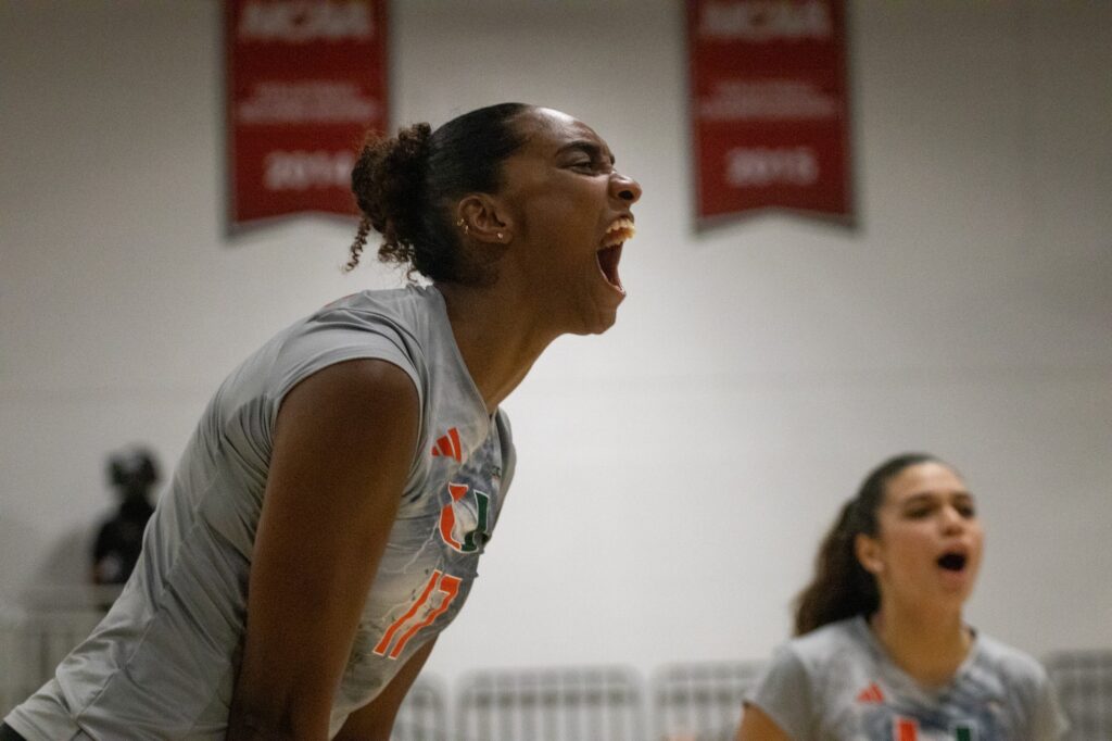 Graduate student middle blocker Janice Leao celebrates winning a point during Miami's match versus Florida Atlantic University in the Knight Sports Complex on Aug. 28, 2023.