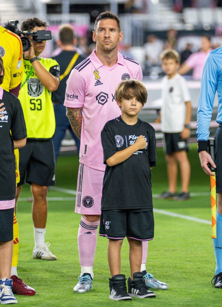 Miami forward Lionel Messi stands for the national anthem at the start of Inter Miami’s match versus Toronto FC at DRV PNK Stadium on Sept. 20, 2023.