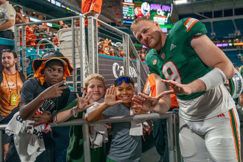 Fourth-year junior quarterback Tyler Van Dyke throws up the U with fans after Miami’s 48-7 win over Bethune Cookman at Hard Rock Stadium on Sept. 14, 2023.