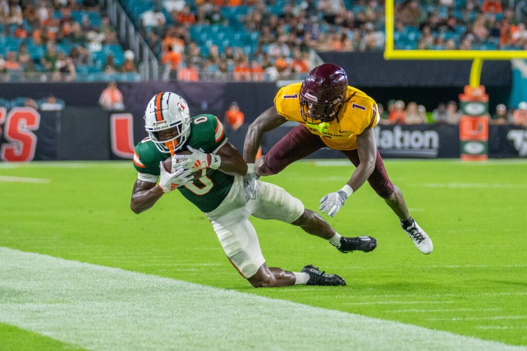 Junior wide receiver Brashard Smith stays in bounds to make a catch in the third quarter of Miami’s game versus Bethune Cookman at Hard Rock Stadium on Sept. 14, 2023.
