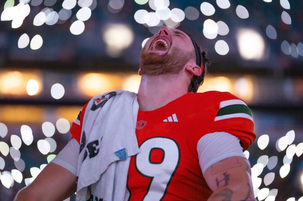 Fourth-year redshirt sophomore long snapper Mason Napper celebrates on the sidelines before the start of the fourth quarter of Miami’s game versus Miami (OH) at Hard Rock Stadium on Sept. 1, 2023.