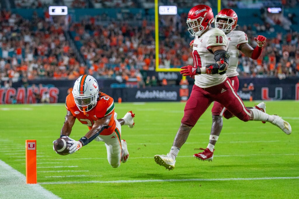 Fourth-year junior running back Henry Parrish, Jr. dives into the endzone in the fourth quarter of Miami’s game versus Miami (OH) at Hard Rock Stadium on Sept. 1, 2023.