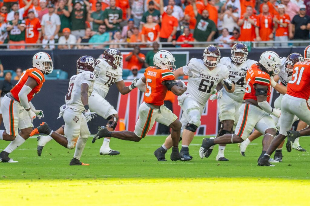 Junior safety Kamren Kinchens runs for a 28-yard return in the third quarter of Miami’s game versus Texas A&M at Hard Rock Stadium on Sept. 9, 2023.