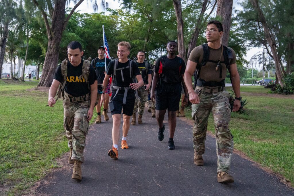 Participants arrive at Tropical Park, during the first leg of the fourth annual UM Ruck to Remember in the early morning of Sept. 11, 2023.