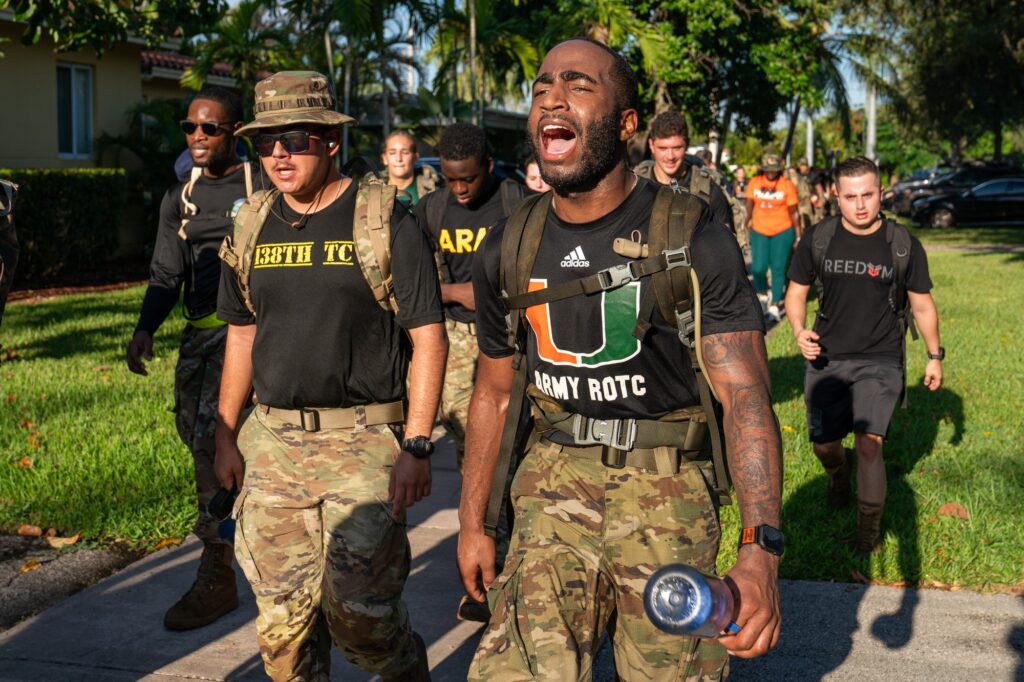 University of Miami Army ROTC cadet Jamari King calls a cadence while heading back to campus during the second leg of the 9.11 mile memorial ruck on Sept. 11, 2023.