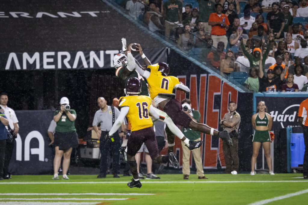 Junior Colbie Young catches a pass from quarterback Taylor Van Dyke, though later called an incomplete pass, during the 48-7 win against Bethune-Cookman University at Hard Rock Stadium.