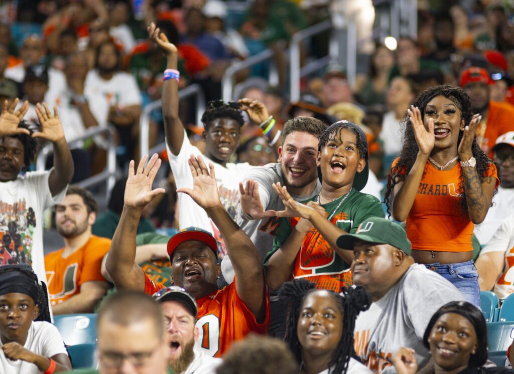 Miami Hurricanes fans cheer and throw up the U as Miami closes in on a win in their game against Miami University (OH) at Hard Rock Stadium on Sept. 1, 2023.