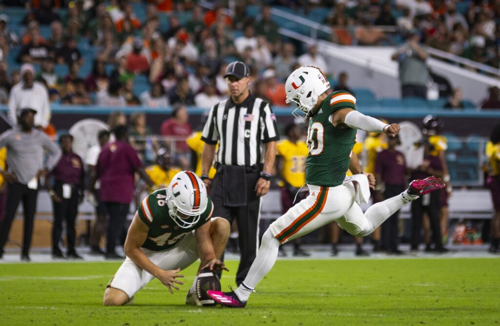 Junior kicker Andres Borregales lines up for a kick after first quarter touchdown during Miami's game against Bethune-Cookman at Hard Rock Stadium on Sept. 14, 2023.