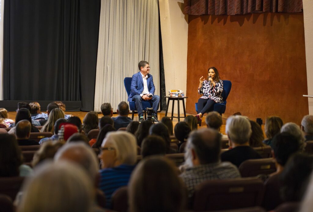 credit: Alexandra Fisher // Award-winning singer, songwriter, and actress Gloria Estefan discusses her music and acting career with Bill Cosford Cinema manager Rene Rodriguez during her movie screening and Q&A session at the Cosford Cinema on Sept. 16, 2023.