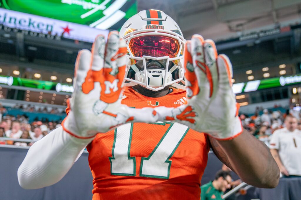 ‘Canes Superman and season ticket-holder Shelton Douthett throws up the U before being recognized on-field in the third quarter of Miami’s game versus Clemson at Hard Rock Stadium on Oct. 21, 2023.