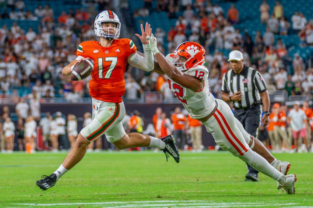 Freshman quarterback Emory Williams scans downfield in overtime of Miami’s game versus Clemson at Hard Rock Stadium on Oct. 21, 2023.