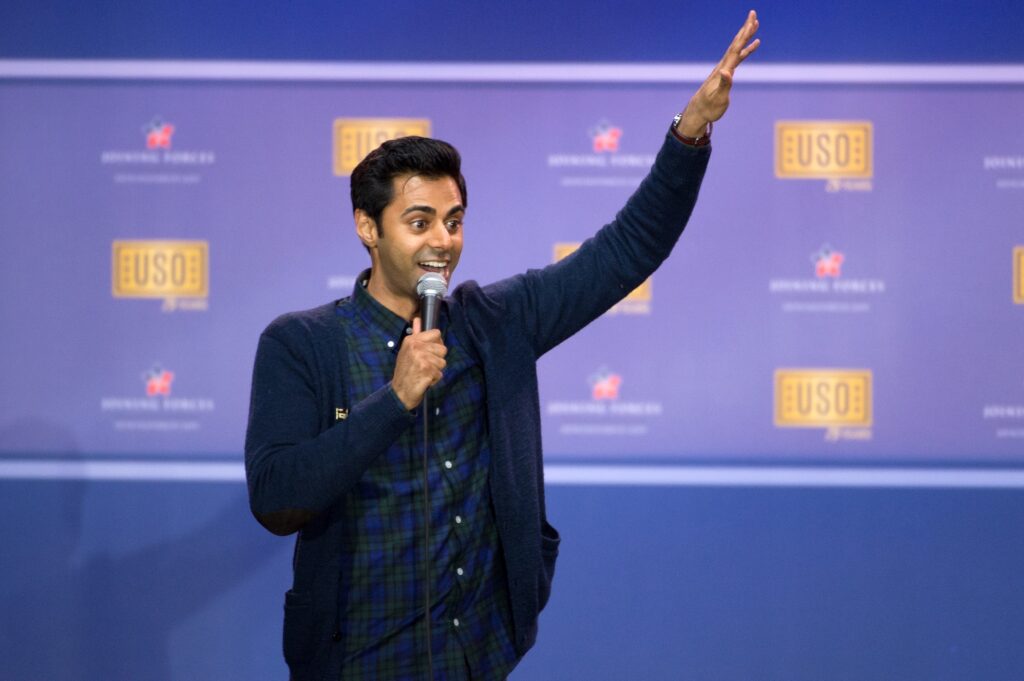 Comedian Hasan Minhaj performs during the comedy show in celebration of the 75th anniversary of the USO and the 5th anniversary of Joining Forces at Joint Base Andrews in Washington, D.C. May 5, 2016.