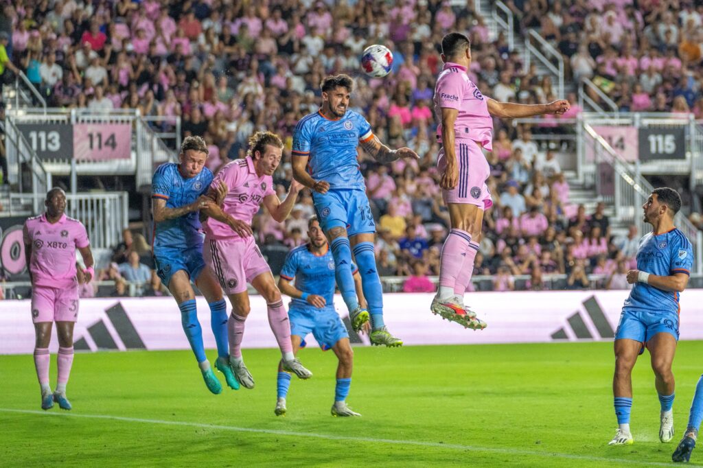 Players jump for a corner kick in the first half of Miami’s friendly match versus New York City FC at DRV PNK Stadium on Nov. 10, 2023.