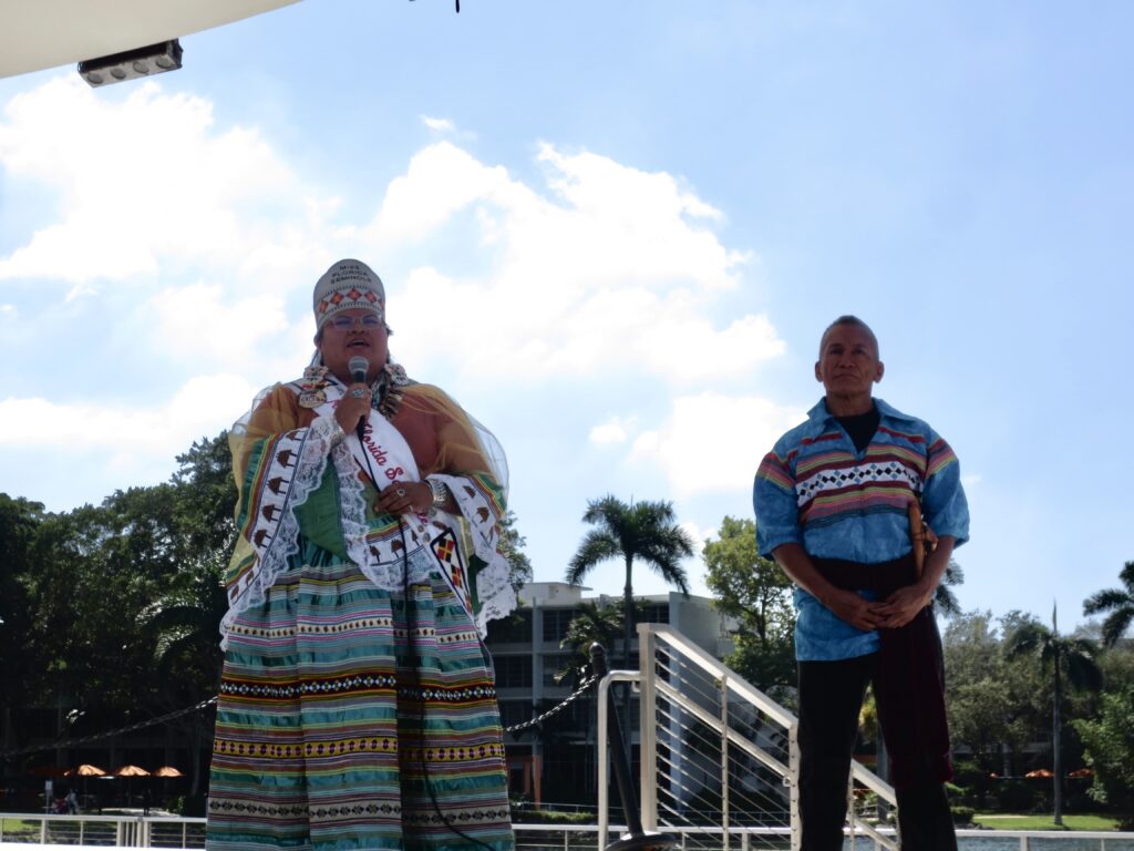 Samuel Tommie and Miss Florida Seminole Thomlynn Billie, both members of the Seminole tribe, speak about the importance of Native American month during Indigecanes' Native American Heritage Month Kickoff event on Nov. 1.