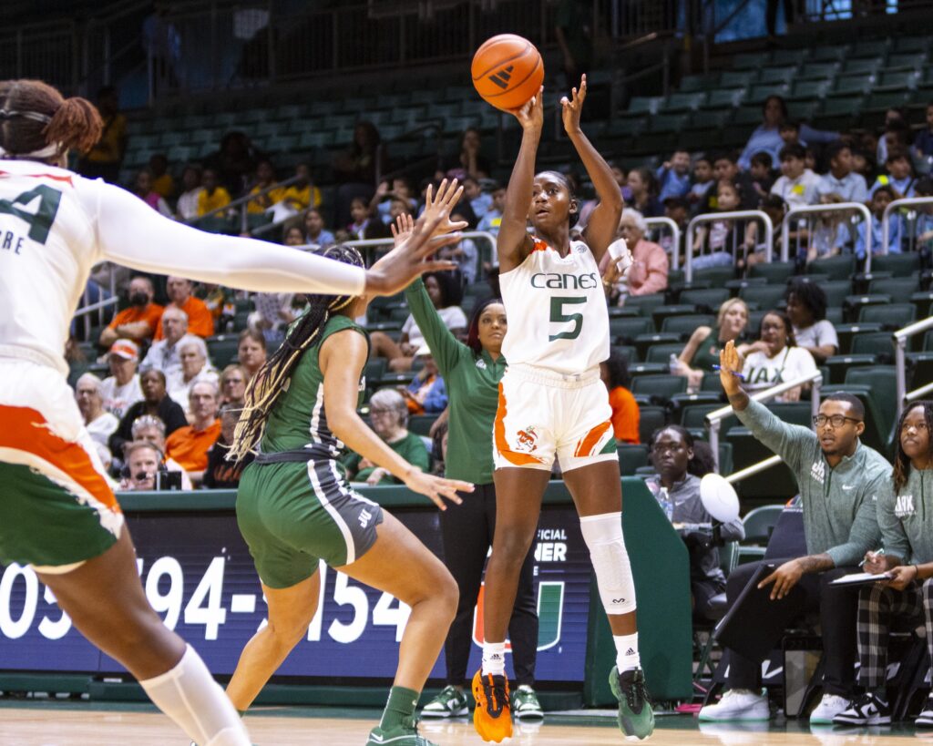 During the season opener, graduate student Jaida Patrick shoots a long two-point shot during the ‘Canes’ 28-point win against Jacksonville University on Thursday, Nov. 9 at the Watsco Center.