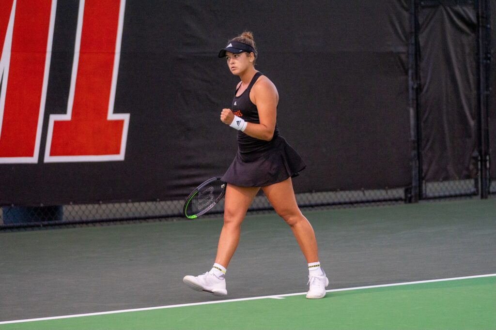 Diana Khodan celebrates after winning a point during her singles match versus Georgia Tech sophomore Ruth Marsh at the Neil Schiff Tennis Center on Feb. 25, 2022.