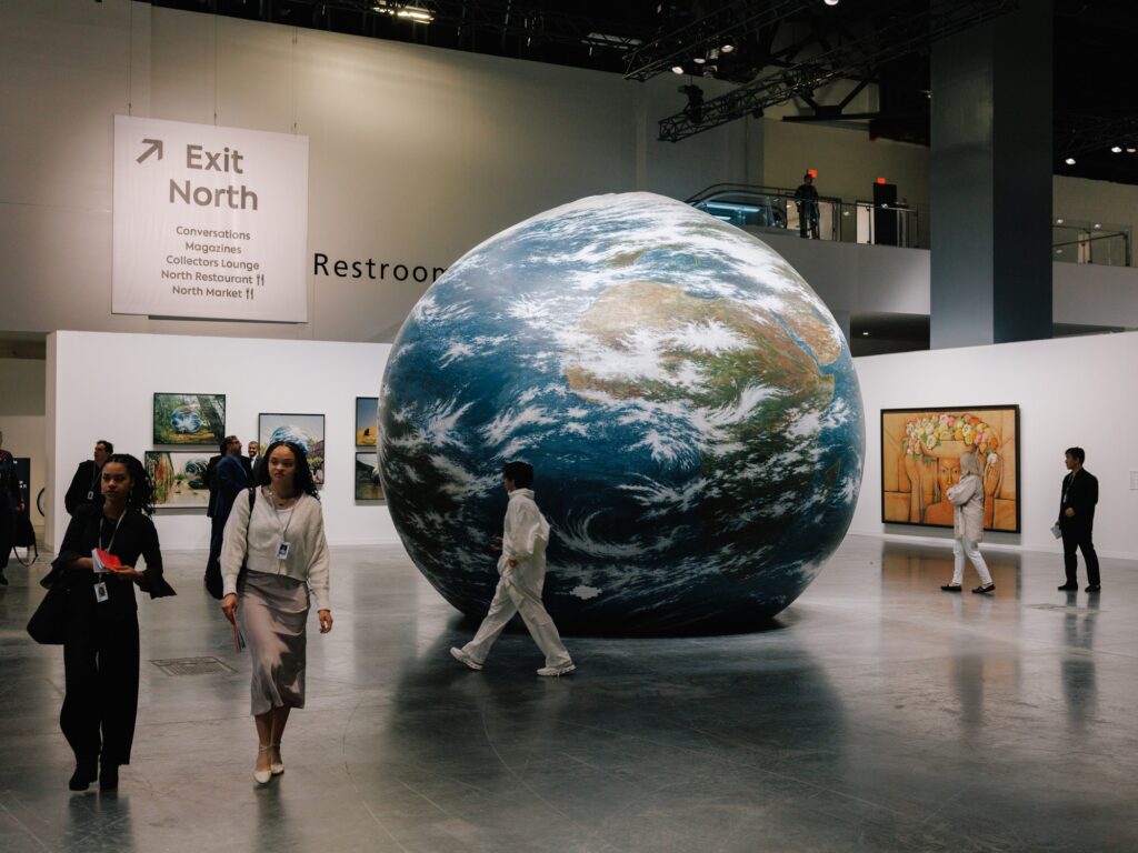 The Meridians section of Art Basel featured "Earth Play" by artist Seung-taek Lee, an inflatable balloon painted with a satellite image of Earth.