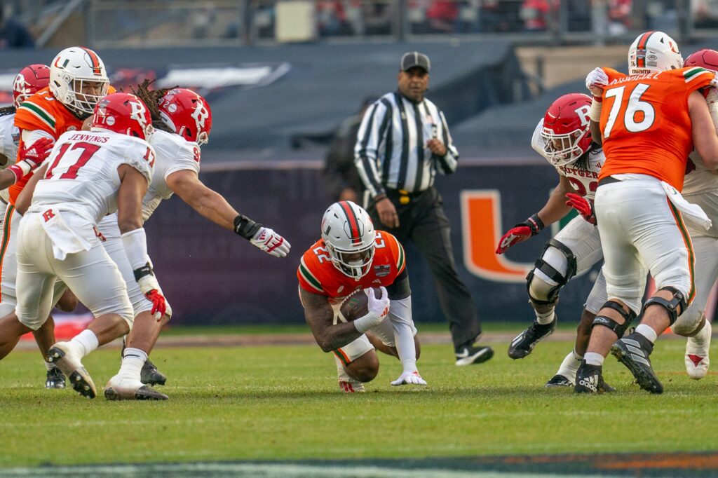 Fourth-year junior running back Henry Parrish, Jr. goes down with an injury in the first quarter of Miami’s Pinstripe Bowl Matchup versus Rutgers at Yankee Stadium on Dec. 28, 2023.