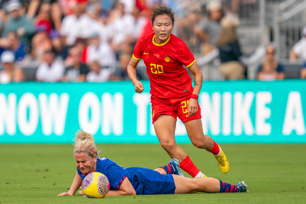 Midfielder Lindsey Horan is fouled in the first half of the USWNT match versus China PR at DRV PNK Stadium on Dec. 2, 2023.