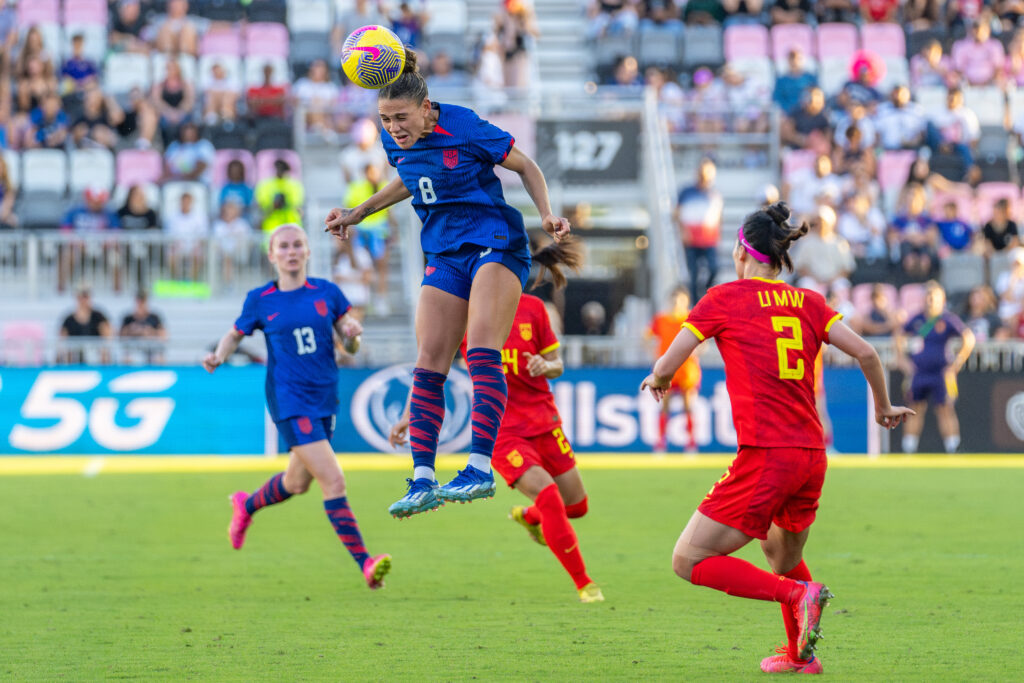 Forward Trinity Rodman goes for a header in the second half of the USWNT match versus China PR at DRV PNK Stadium on Dec. 2, 2023.