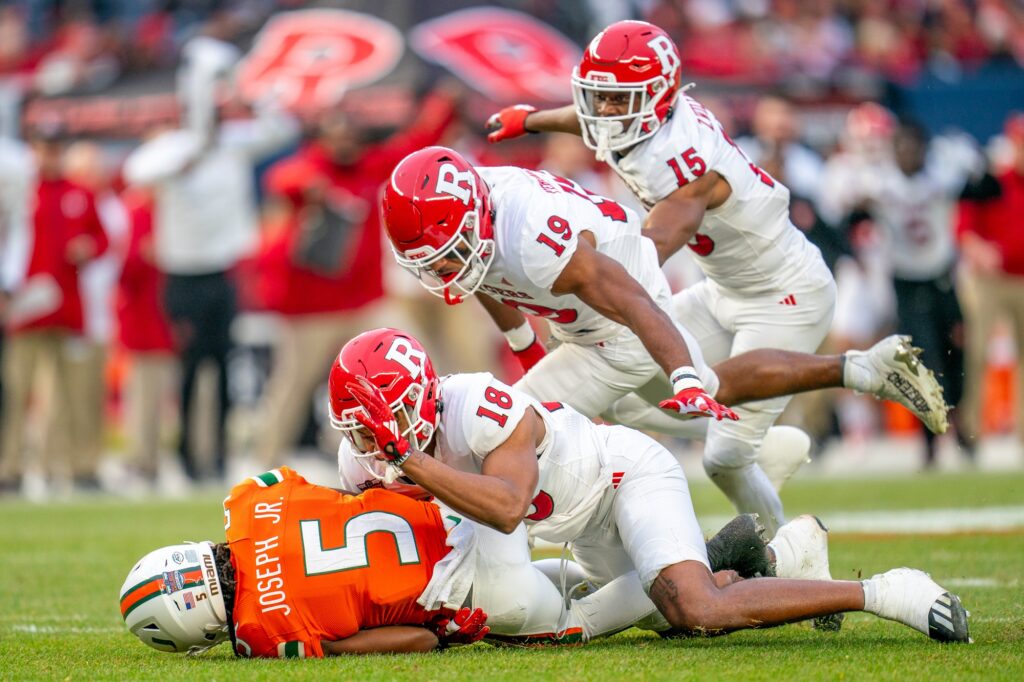 Freshman wide receiver Ray Ray Joseph is tackled during a kick-return in the first quarter of Miami’s Pinstripe Bowl matchup versus Rutgers at Yankee Stadium on Dec. 28, 2023.